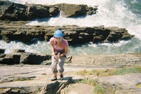 Glenda abseiling at Baggy Point