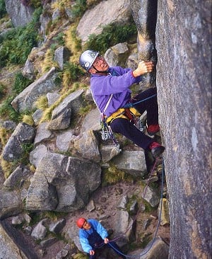 Joe Brown repeating The Right Unconquerable, Stanage, 47 years after making the first ascent, belayed by Claude Davies  © Gordon Stainforth