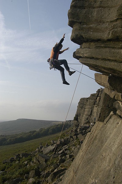 Duncan Irving taking a graceful exit from Flying Buttress Direct (E1 5b), Stanage  © Adrian Japp