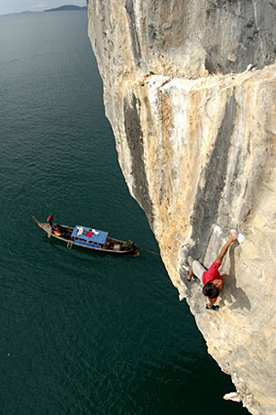 David Lama making the akward dyno on the route in Thailand - First Ascent DVD.  © First Ascent