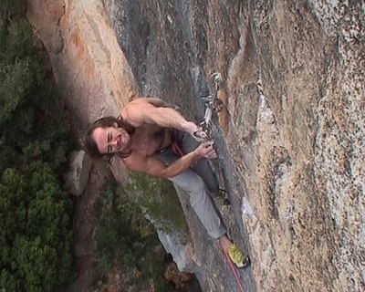 Dave Macleod climbing L’odi Social 8c+ at Campi Qui, Siurana in Spain