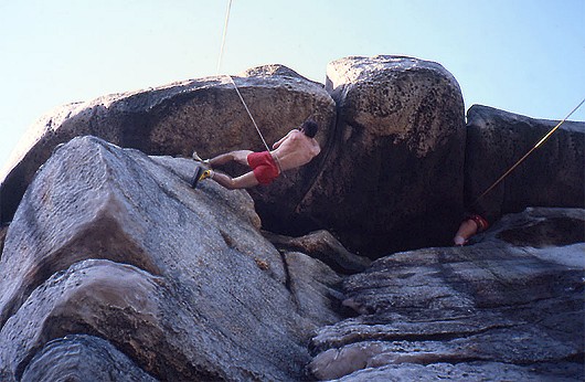 Matt Saunders climbing the desperate 'The Thing' '6b' at Bowles  © Gordon Stainforth