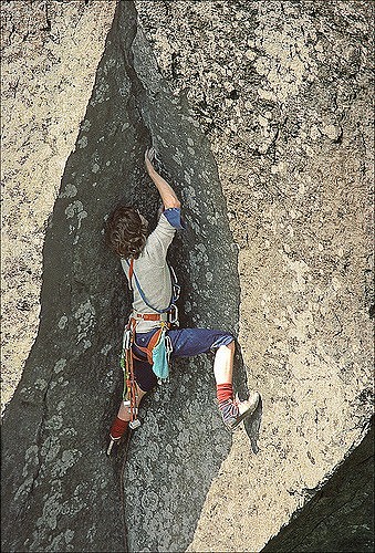 the delicate overhanging groove (or pod) that leads to the headwall on the final pitch of Void (E3,6a) on Craig Bwlch y Moch