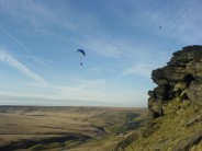 Paraglider over Pule Hill Rocks