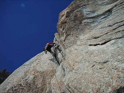 Steep crack climbing on the Contamine Route, Point Lachenal.  © gav p