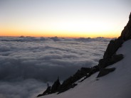 Sunset above the clouds by Cosmiques Arete