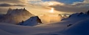 Winter sunrise from the Abri Simond looking towards the Grandes Jorasses and Italy (2 alpinists on the RHS)<br>© Jonathan Griffith
