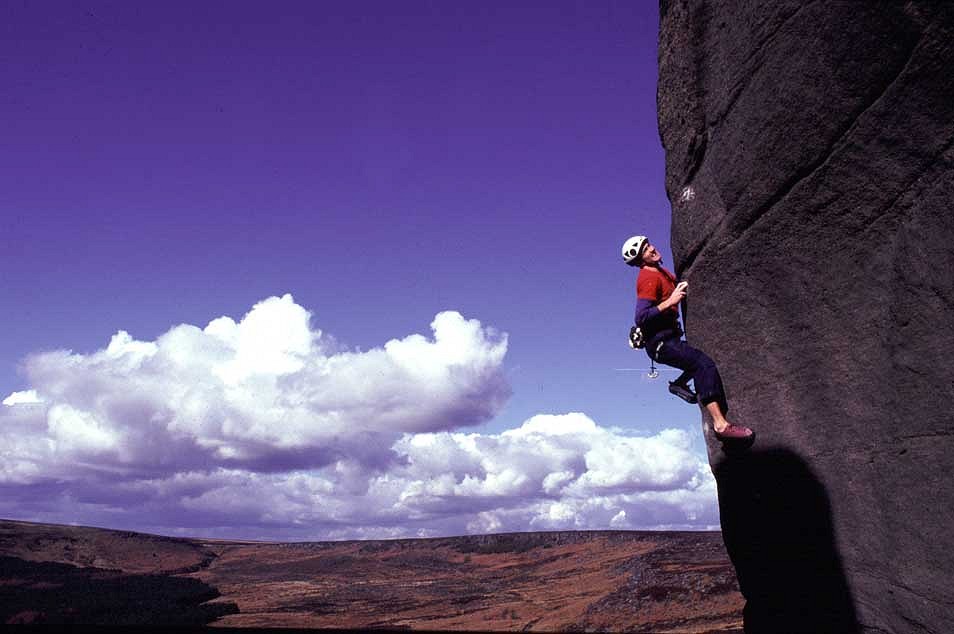 Neil Bentley approaches the crux on Equilibrium (E10 7a), Burbage South  © Mark Turnbull