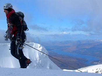 Pete Rowlands tops out from a thin Ben Nevis ice route with a large and mixed rack.   © Rob Jarvis