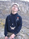 Belaying with fingertape face on my hoodie