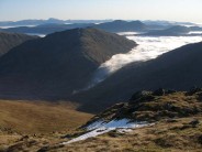 Sea of cloud spilling over from Loch Arkaig to Glen Kingie.