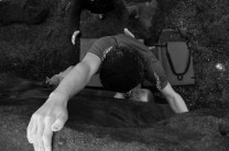 Duncan Kaye tops out an unnamed arête at Caley Adrenaline Rush Boulders
