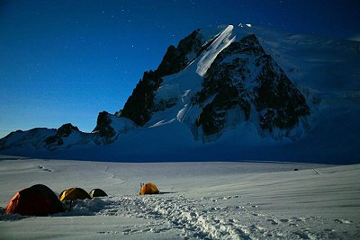 Camping under a rising full moon beneath the Tacul  © Jonathan Griffith