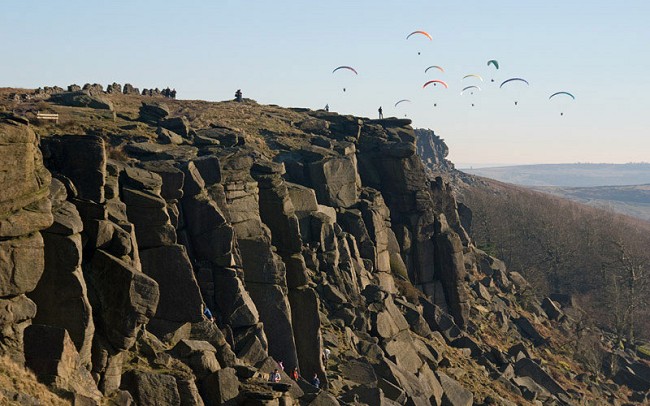 A busy day at Stanage attracting users from many different outdoor activities  © Alan James