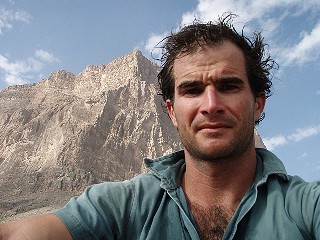 Brendan under the 1200m face of Jebel Misht