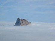 View Of The Penon Above The Mist Over Calpe