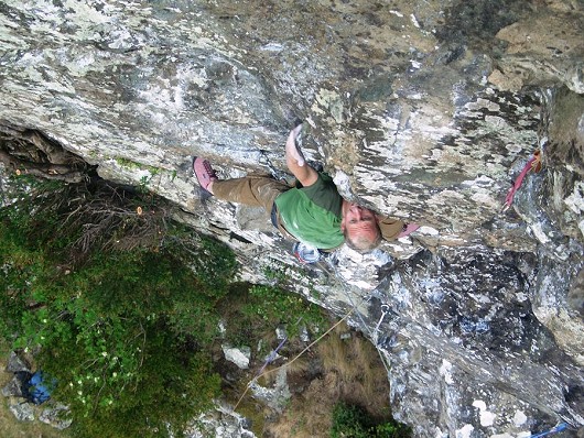 Duncan Booth climbing 'The Iron Man' E7 6c on Iron Crag Thirlmere The Lake District.  © awsomal