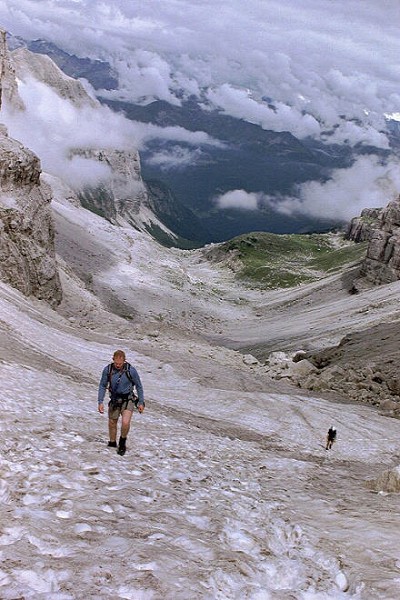 James Watson walking up the Bochette Glacier in the Dolomites  © clarke