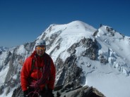 Sumit of Mt. Blanc du Tacul with Mt. Maudit and Mt. Blanc behind