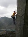 Sion Idwal Long seconding XXXposure (6a+)in the Llanberis slate quarries
