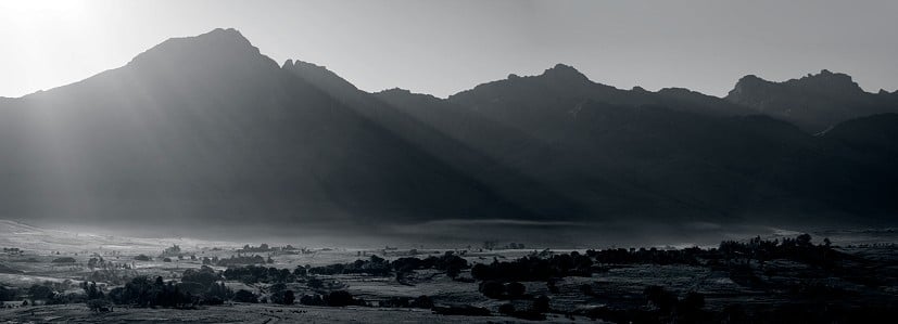 Early morning sun burns mist from rice fields in the Tsaranoro valley, Madagascar  © Jack Geldard -  Editor - UKC